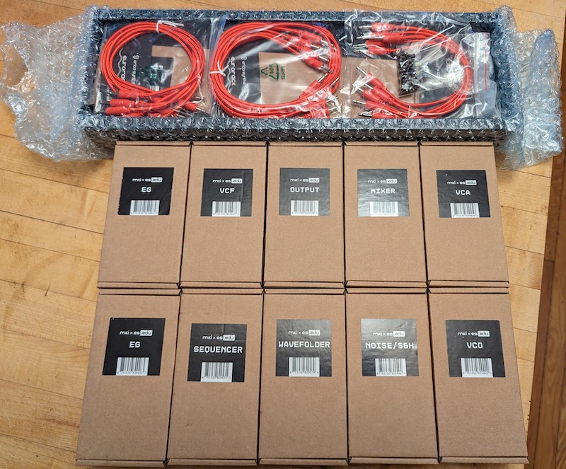 Little boxes containing each module kit