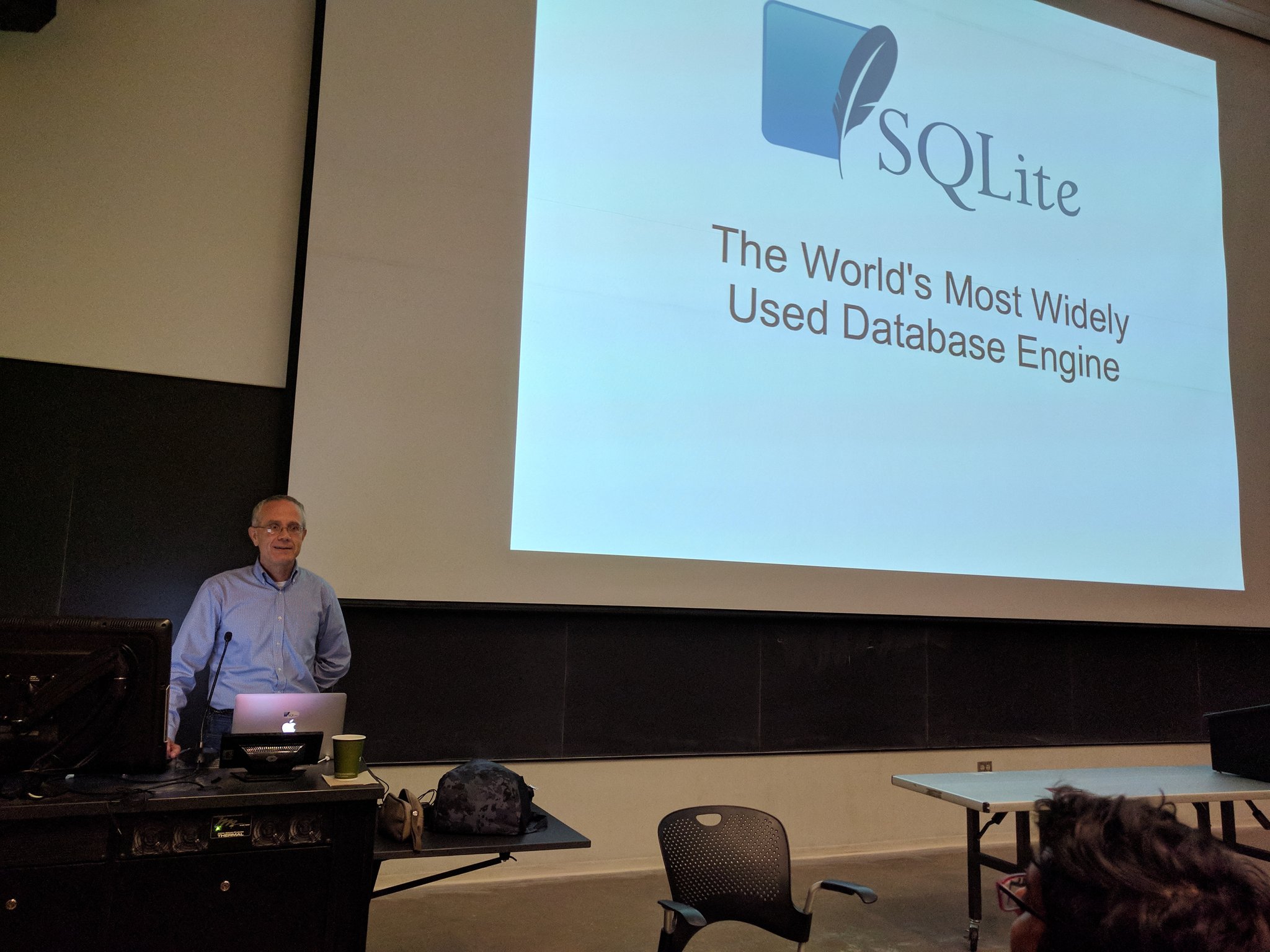 D. Richard Hipp with title slide for SQLite presentation.