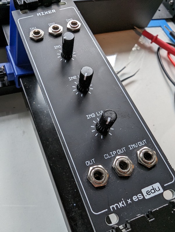 The faceplate of the Mixer module. It has three potentiometer knobs and six jack sockets